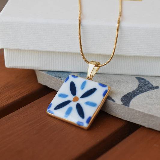 Lisbon Tales necklace detail – azulejo tile-inspired pattern with 24k gold, by Joska Handmade
